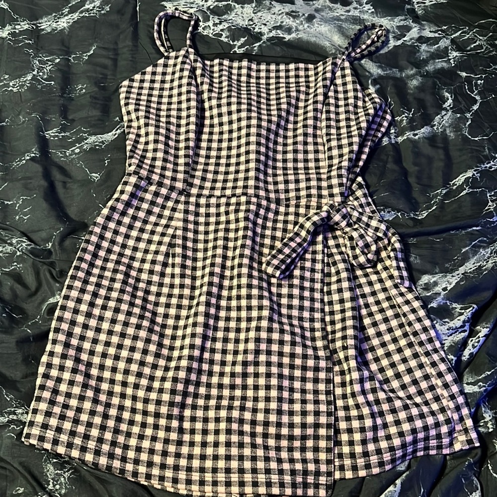 black and pink checkered, shorts underneath the dress